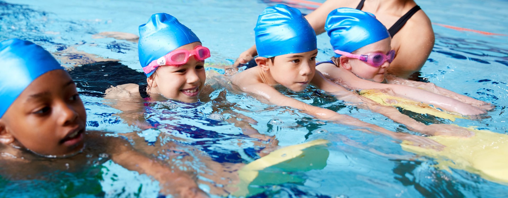 Children in a swimming lesson